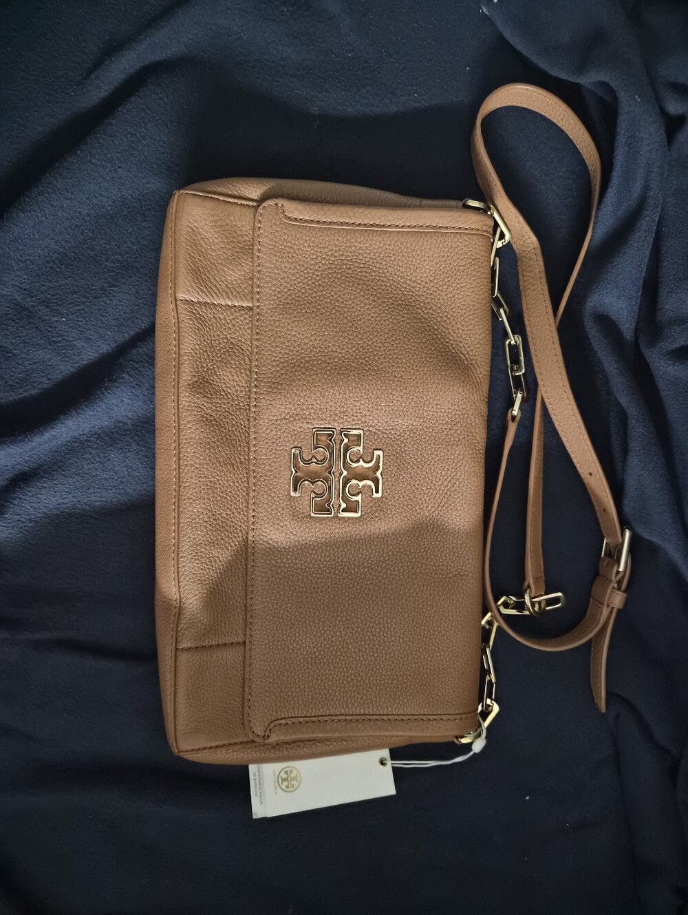 Tory Burch Britten Convertible Fold-Over Crossbody Bag.